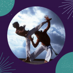 2 capoeira players in action - Vladimir Frama Batuque Capoeira